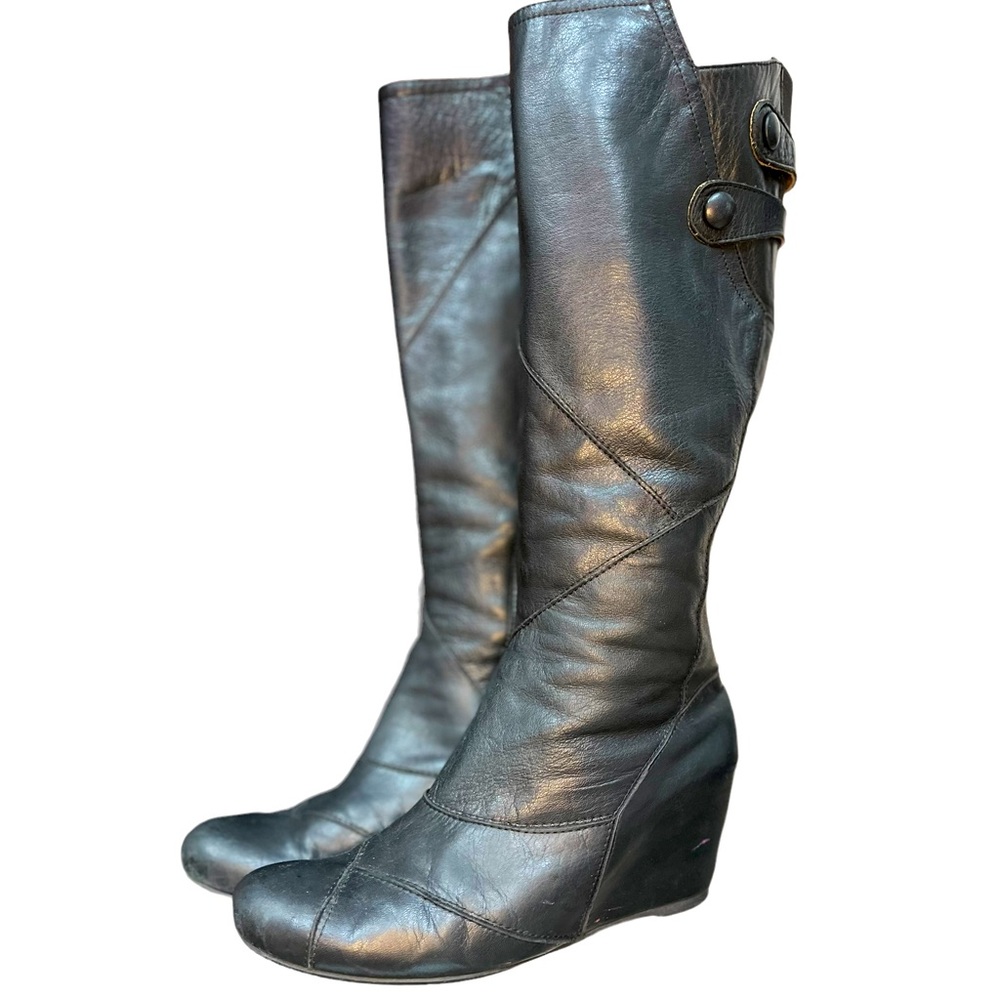 Black Miz Mooz tall leather boots.